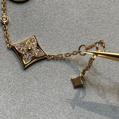[VA]STAR AND SUN 4 MOTIFS GOLD DIAMONDS BRACELET