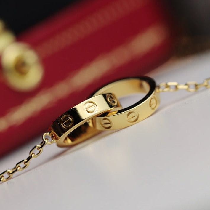 [VA]LIEBESKETTE DOPPELRING GOLD
