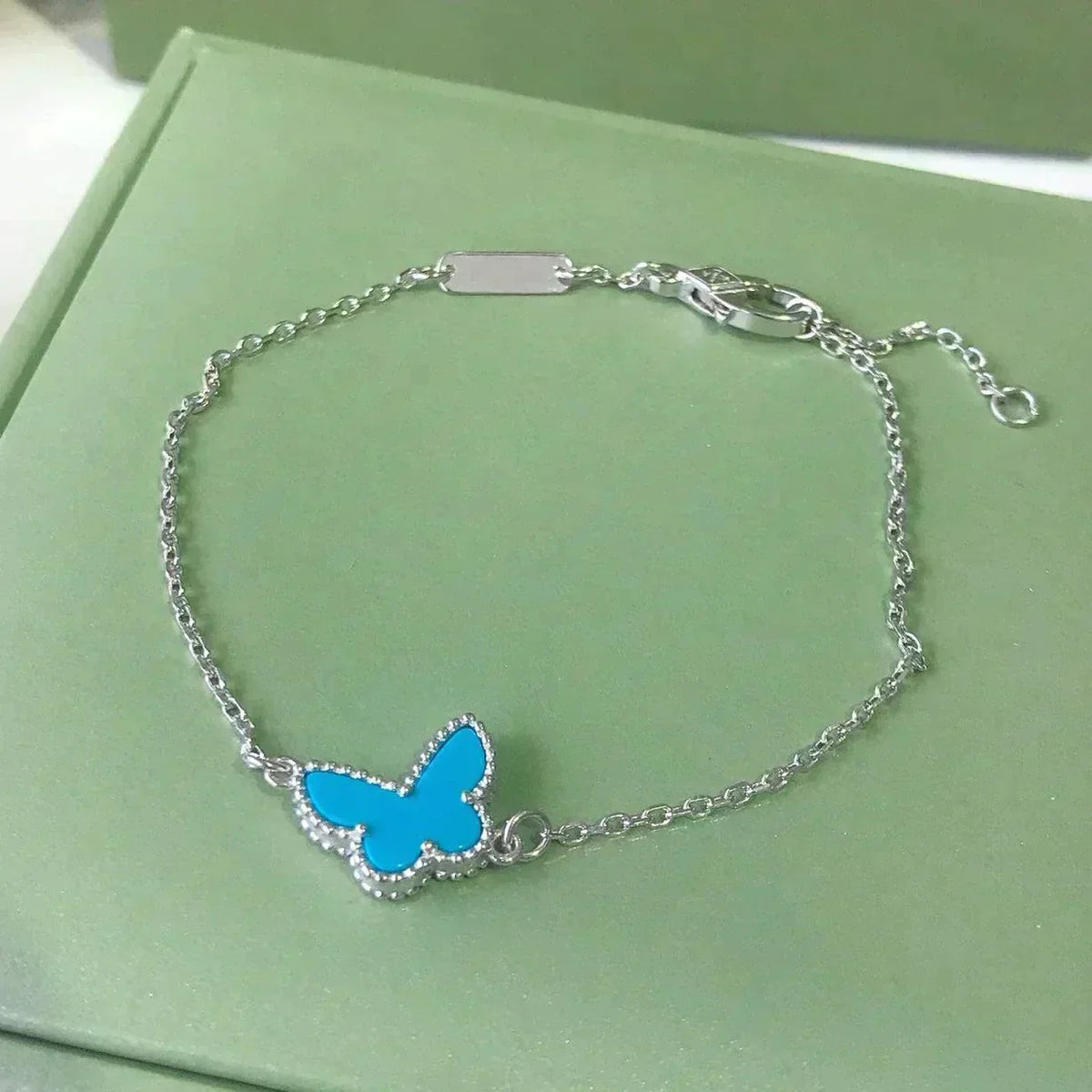[VA]SCHMETTERLINGS-ARMBAND TÜRKIS SCHMETTERLING SILBER