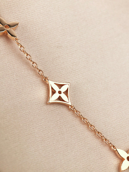 [VA]STAR AND SUN 7 MOTIFS GOLD BRACELET