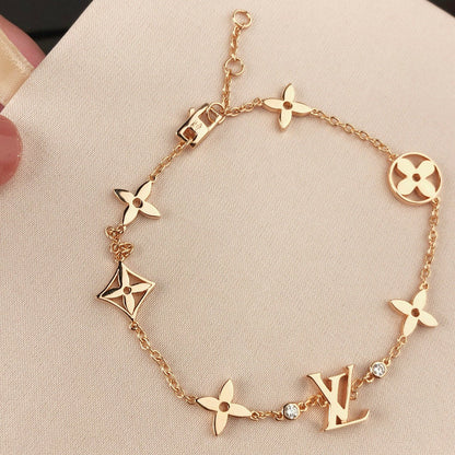[VA]STAR AND SUN 7 MOTIFS GOLD BRACELET