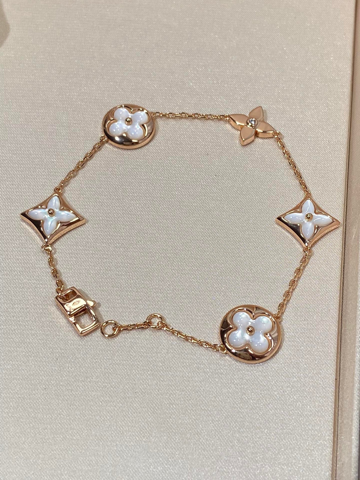 [VA]STAR AND SUN 5 MOTIF MOP PINK GOLD BRACELET