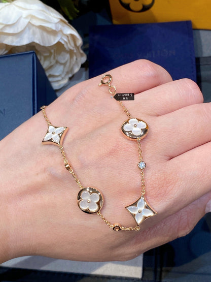 [VA]STAR AND SUN 4 MOTIF WHITE MOP PINK GOLD BRACELET