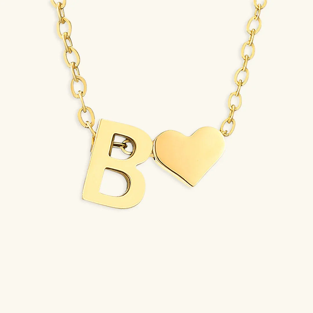{
  "[VA]Ria Initial Letter Gold Necklace": "[VA]Ria イニシャル ゴールドネックレス"
}