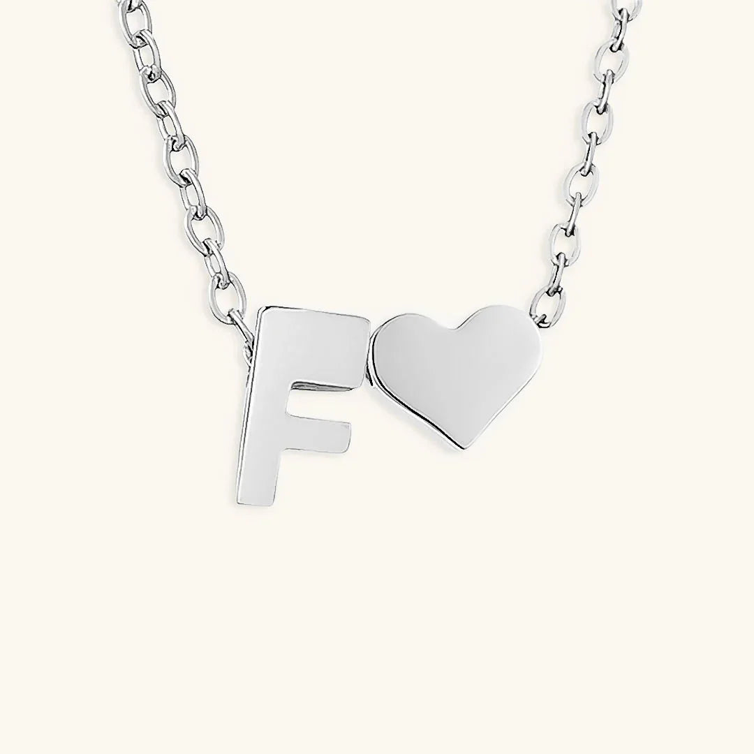{
  "[VA]Ria Initial Letter Gold Necklace": "[VA]Ria イニシャル ゴールドネックレス"
}