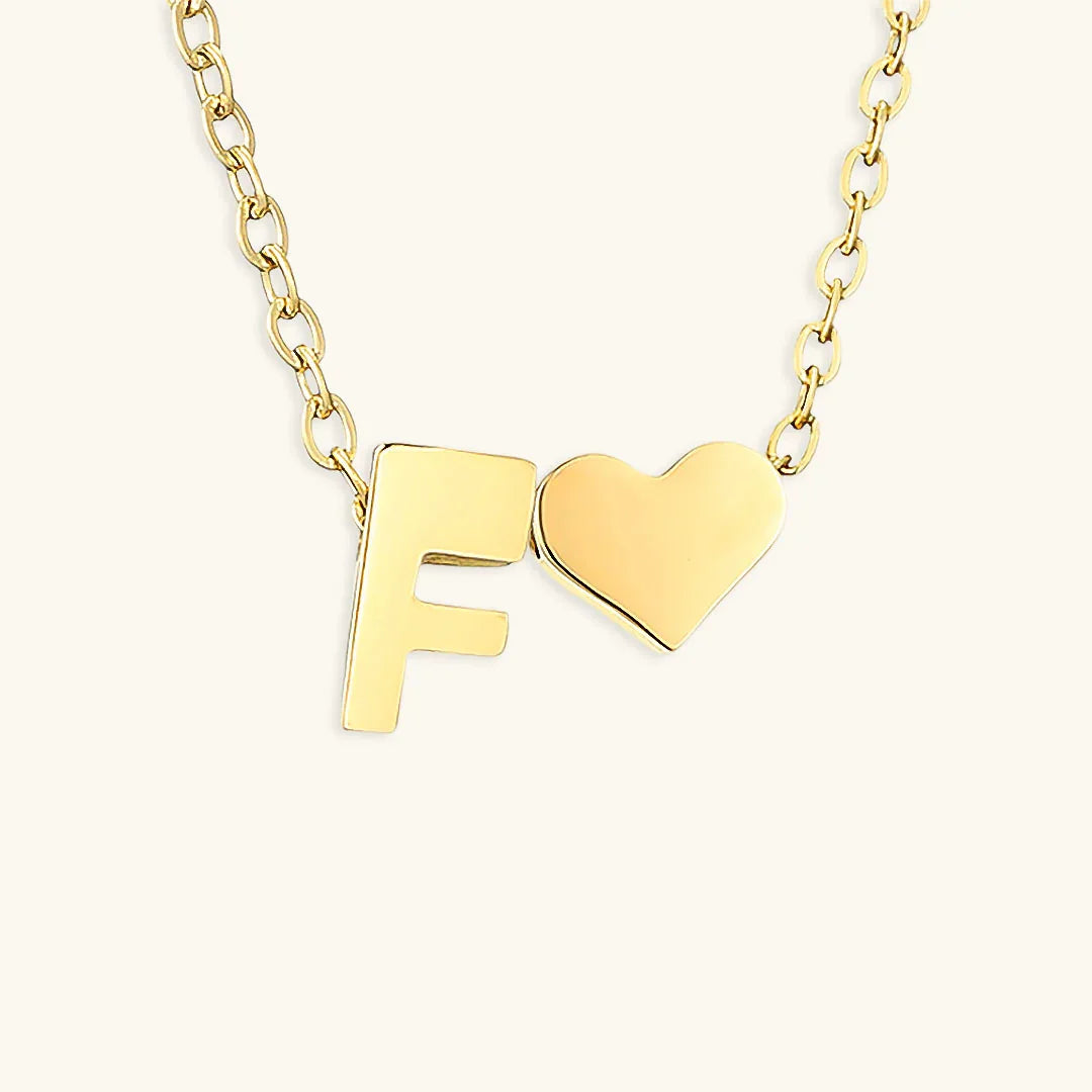 {
  "[VA]Ria Initial Letter Gold Necklace": "[VA]Ria イニシャル ゴールドネックレス"
}