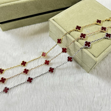[VA]CLOVER ARMBAND MIT 6 MOTIVEN, ROTE ACHAT