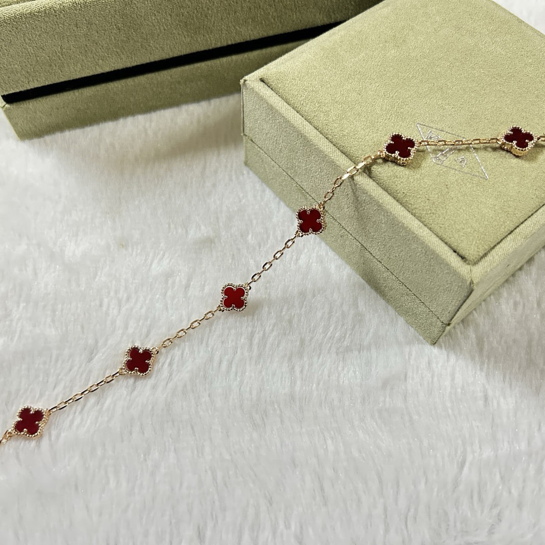 [VA]CLOVER ARMBAND MIT 6 MOTIVEN, ROTE ACHAT