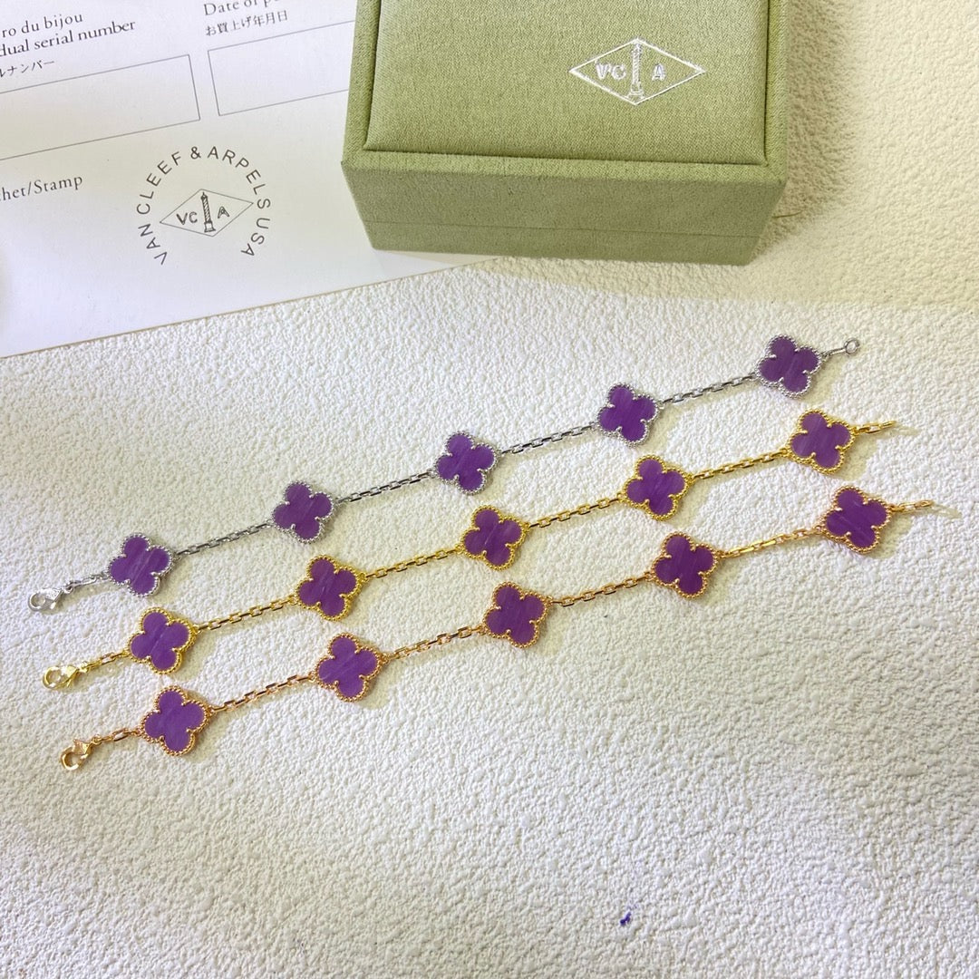 [VA]CLOVER ARMBAND MIT 5 MOTIVEN LILA VIOLETT