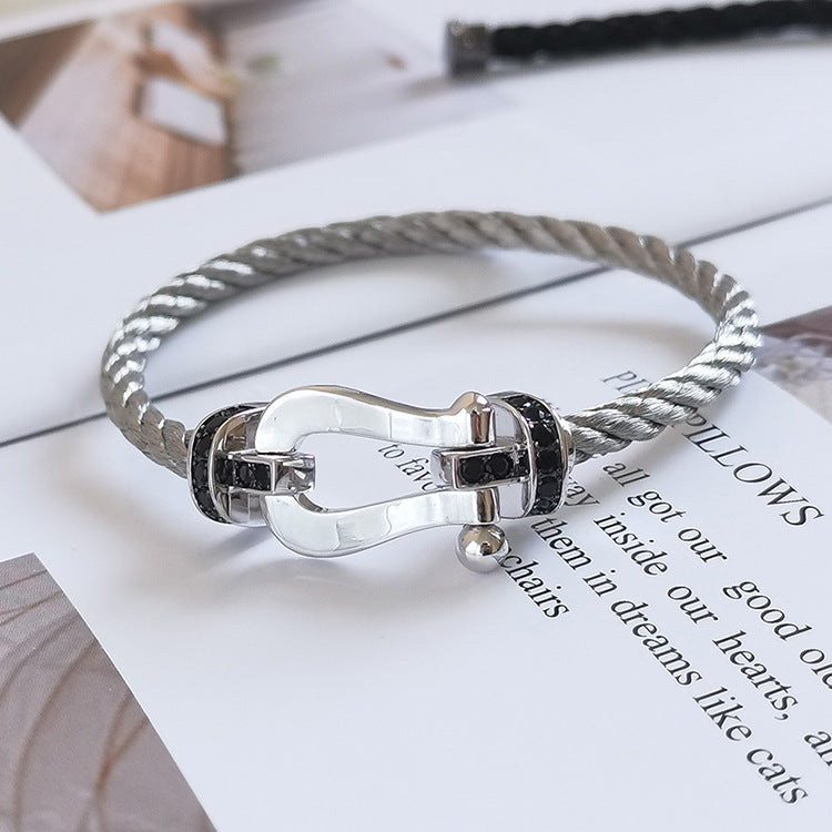 [VA]GROSSES HUFEISEN-ARMBAND MIT SCHWARZEM DIAMANT SILBER