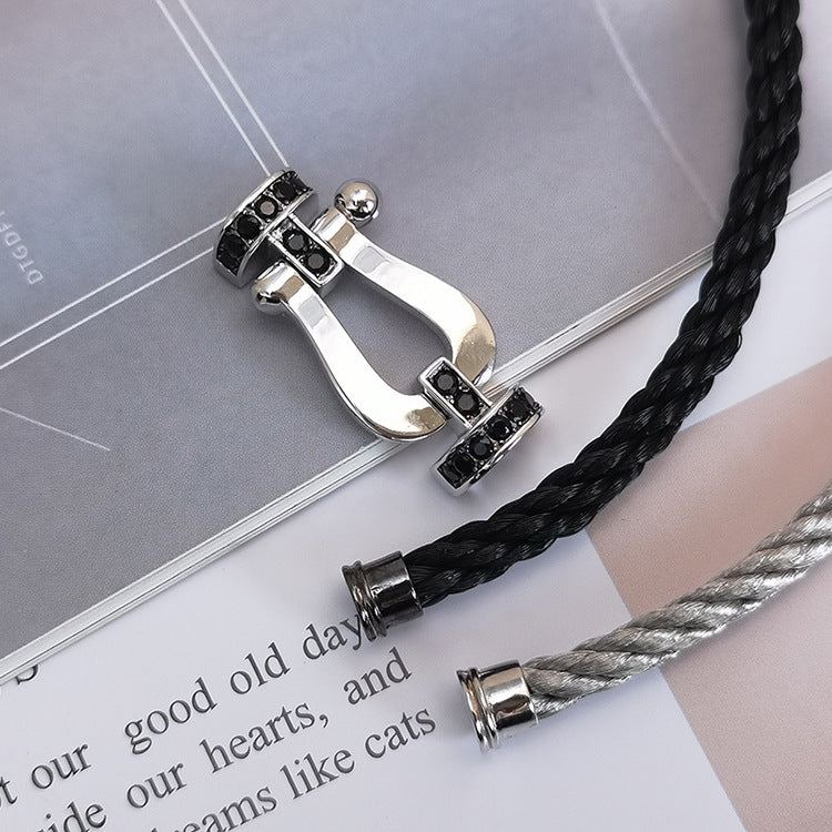 [VA]GROSSES HUFEISEN-ARMBAND MIT SCHWARZEM DIAMANT SILBER