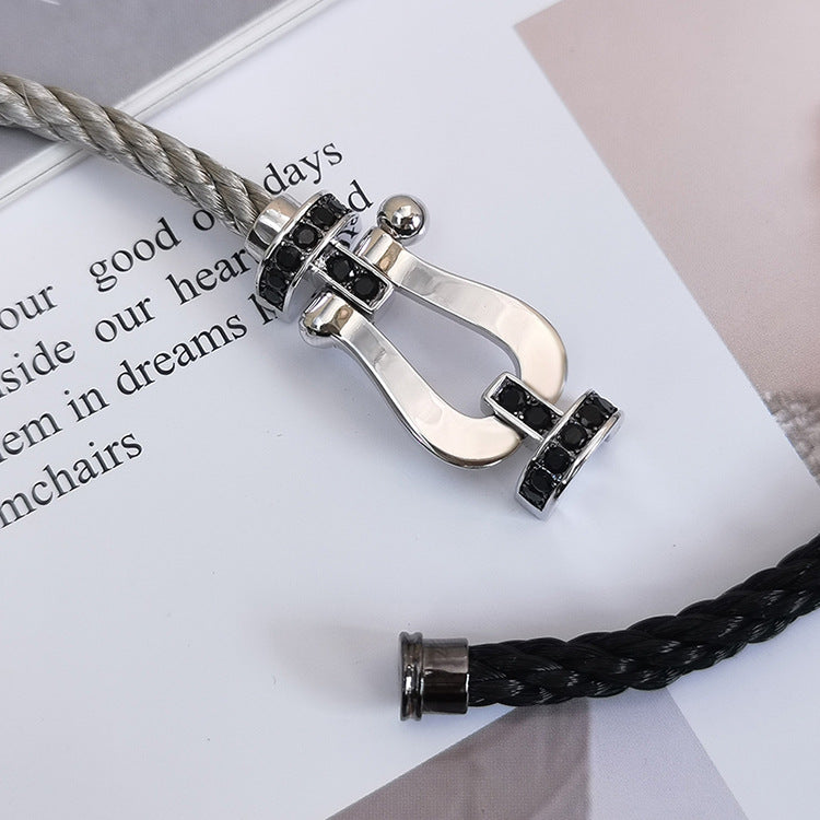 [VA]GROSSES HUFEISEN-ARMBAND MIT SCHWARZEM DIAMANT SILBER