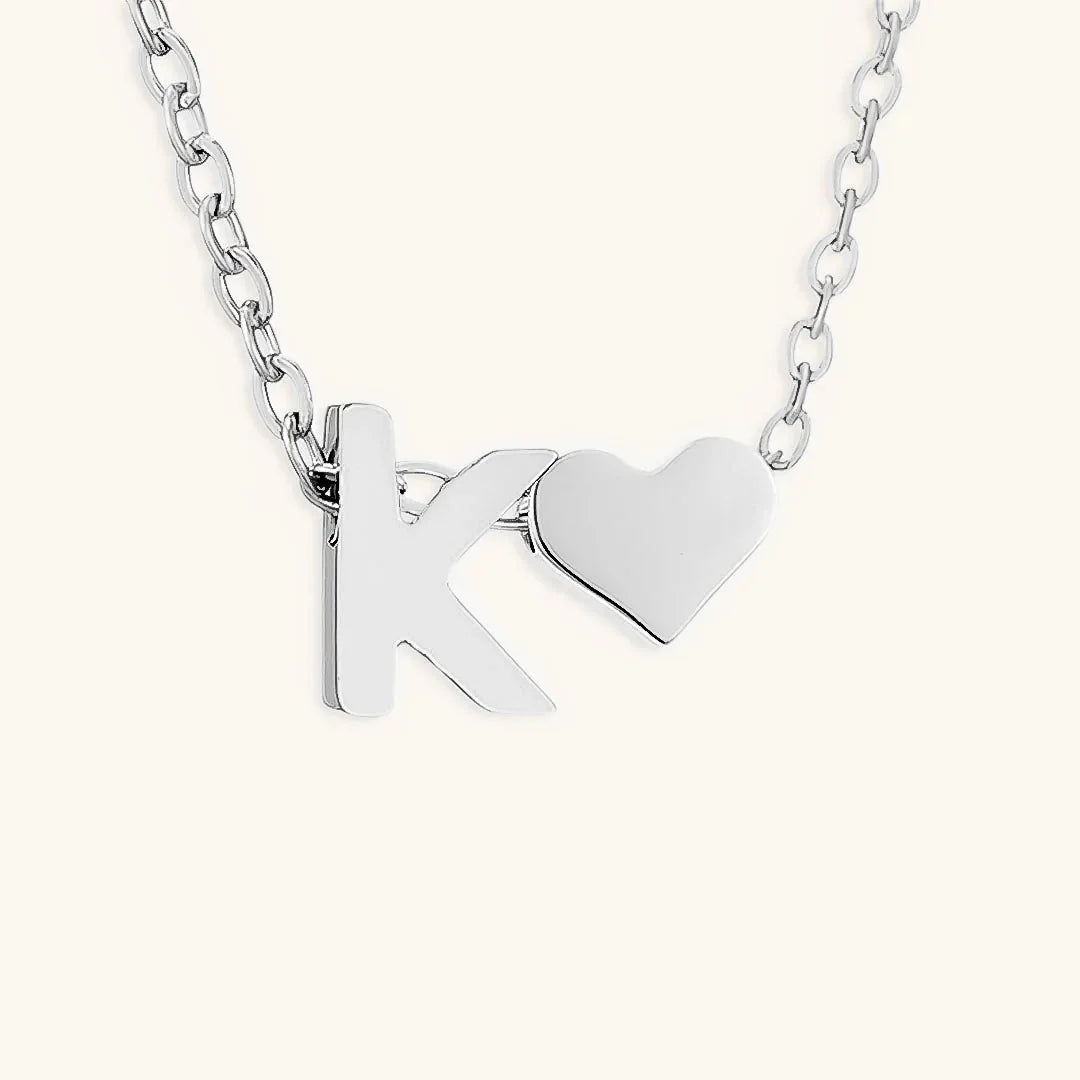 {
  "[VA]Ria Initial Letter Gold Necklace": "[VA]Ria イニシャル ゴールドネックレス"
}