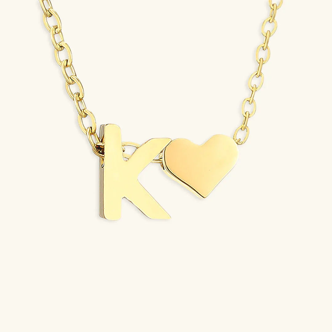 {
  "[VA]Ria Initial Letter Gold Necklace": "[VA]Ria イニシャル ゴールドネックレス"
}