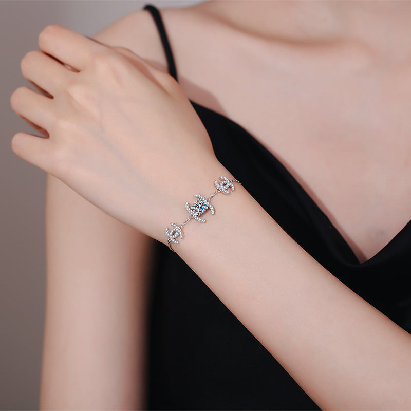 [VA]KLASSISCHES MOISSANIT-ARMBAND MIT VERZAHNTEN GLIEDERN