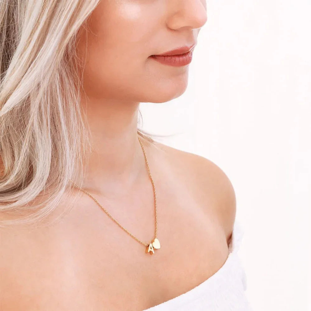 {
  "[VA]Ria Initial Letter Gold Necklace": "[VA]Ria イニシャル ゴールドネックレス"
}