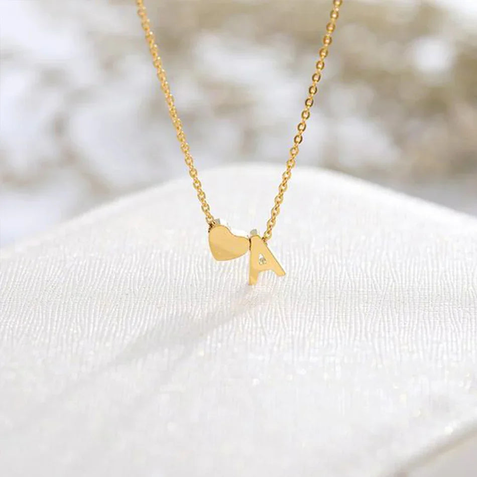 {
  "[VA]Ria Initial Letter Gold Necklace": "[VA]Ria イニシャル ゴールドネックレス"
}