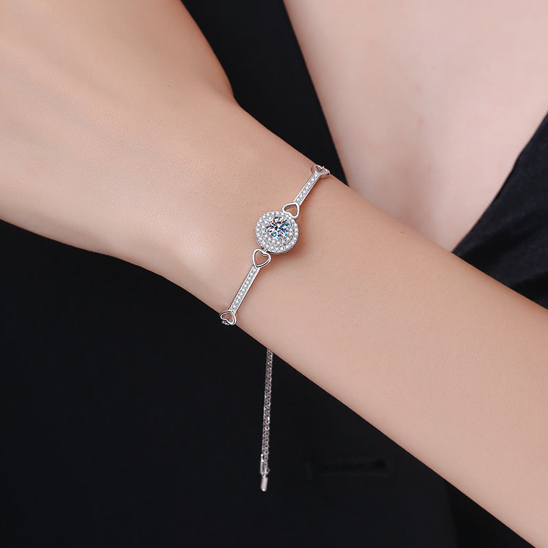 [VA]ARMBAND MIT VERZAHNTEM HERZ & KREIS AUS MOISSANIT