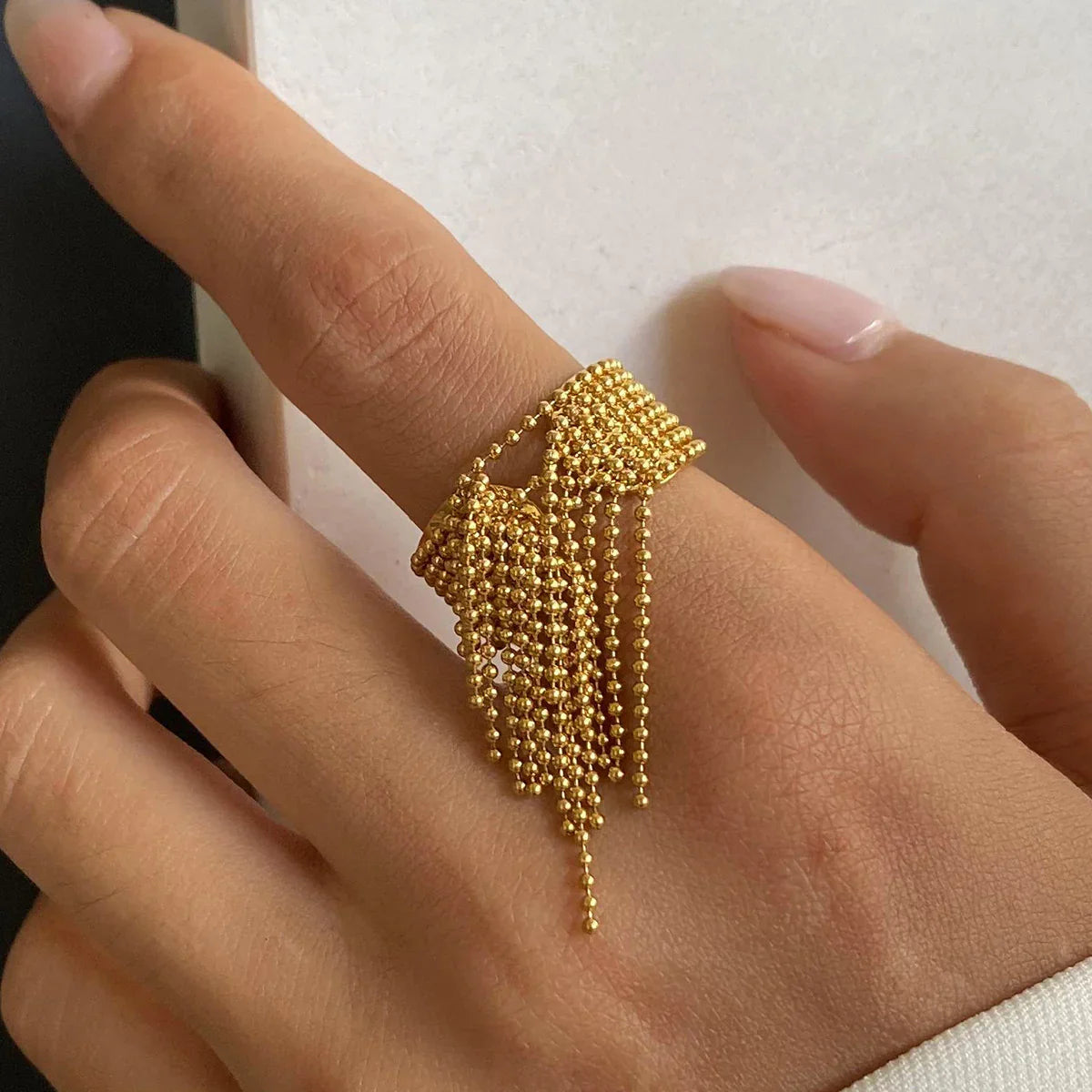 [VA]Krystelle Ring mit goldenen Quasten