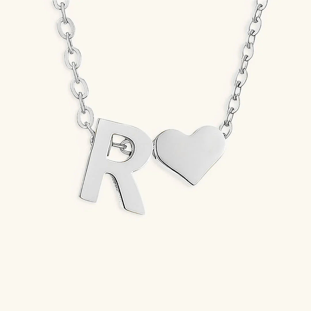 {
  "[VA]Ria Initial Letter Gold Necklace": "[VA]Ria イニシャル ゴールドネックレス"
}