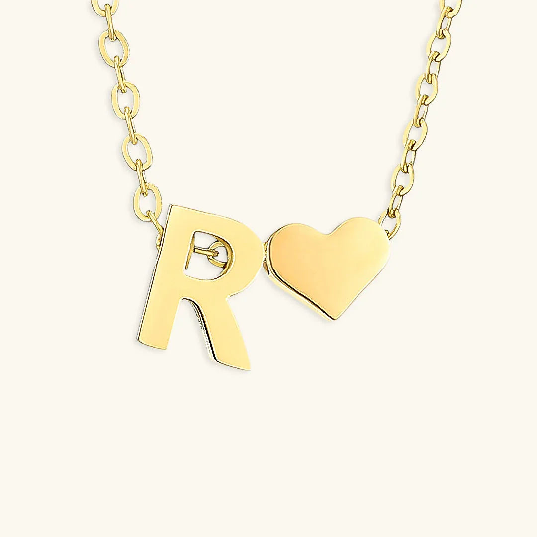 {
  "[VA]Ria Initial Letter Gold Necklace": "[VA]Ria イニシャル ゴールドネックレス"
}