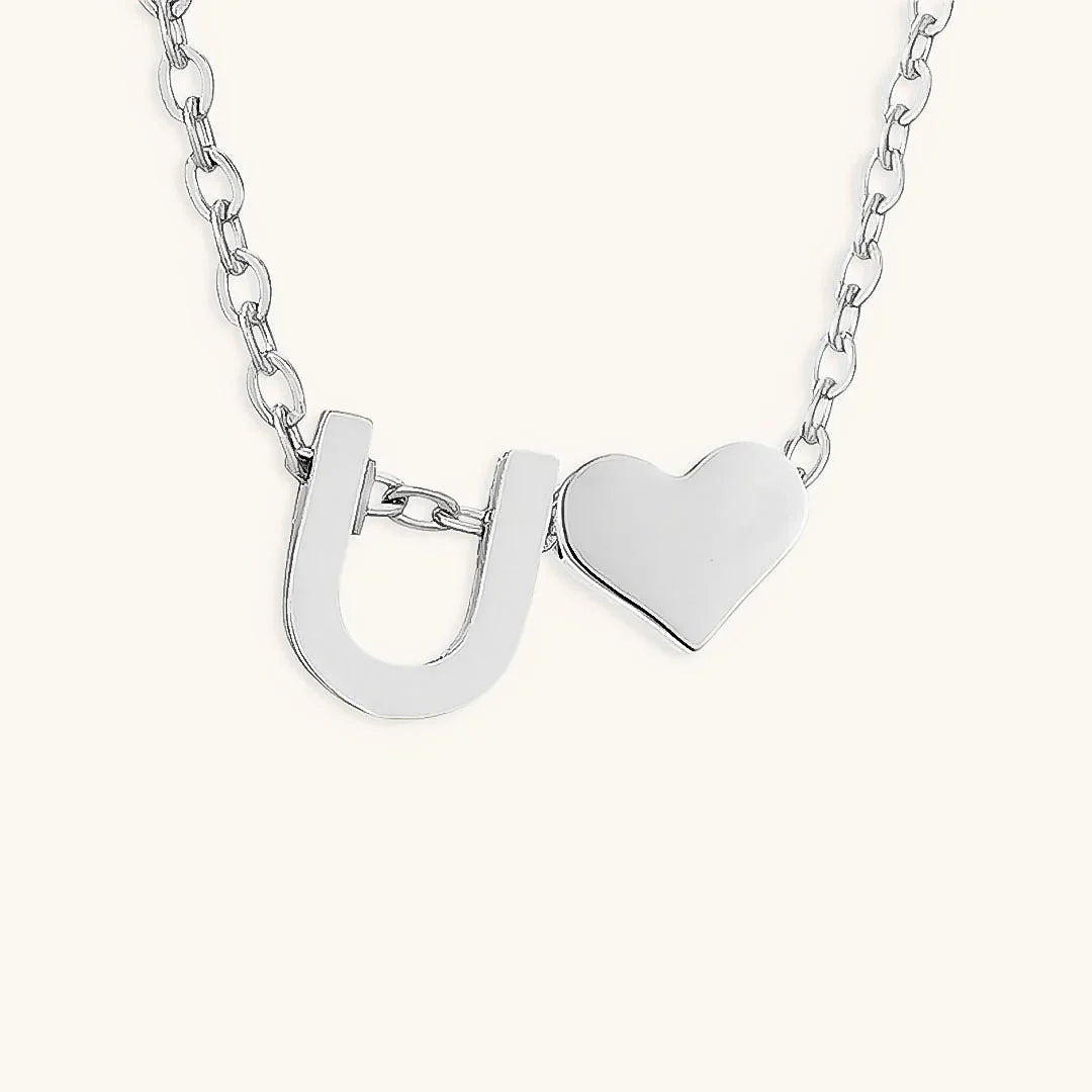 {
  "[VA]Ria Initial Letter Gold Necklace": "[VA]Ria イニシャル ゴールドネックレス"
}
