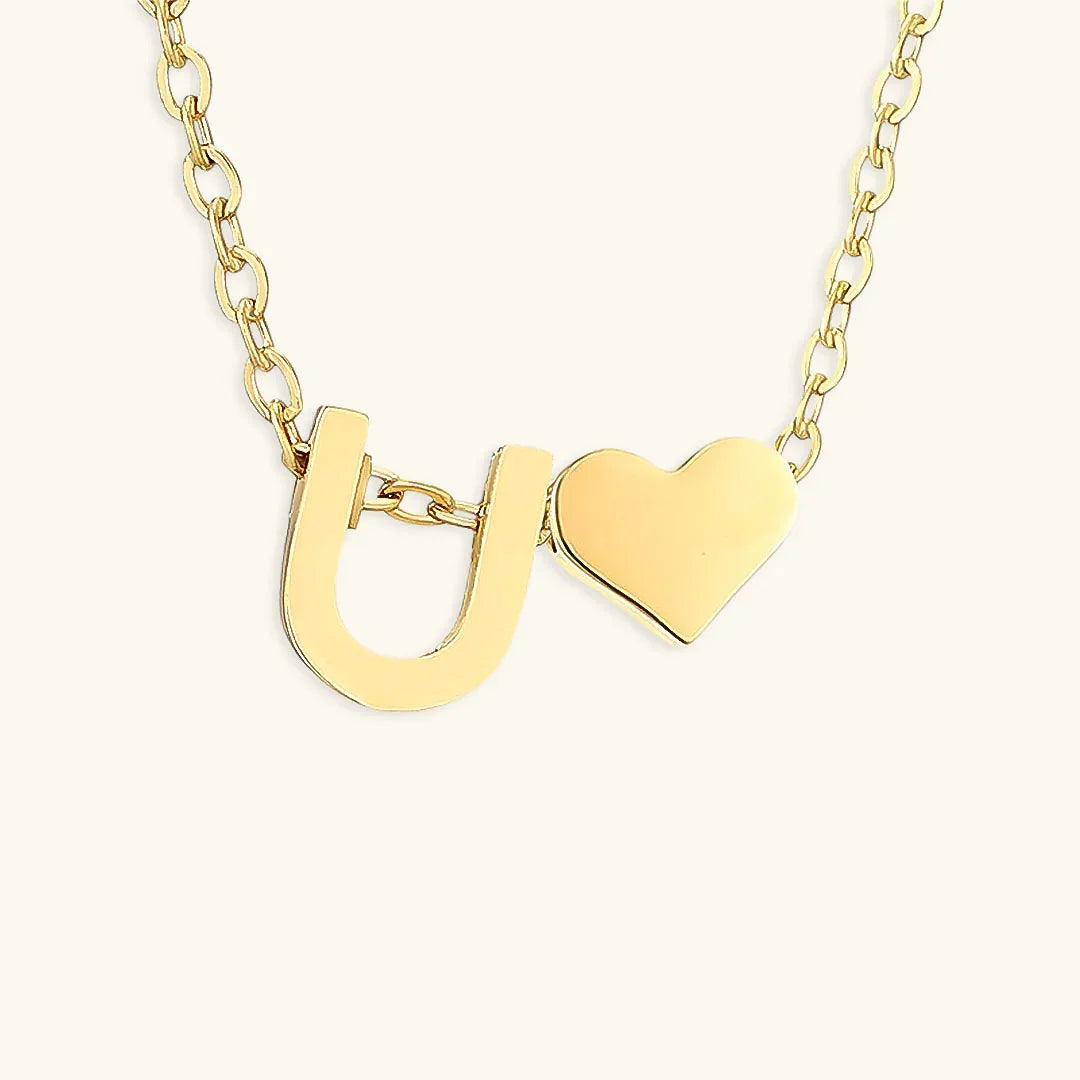 {
  "[VA]Ria Initial Letter Gold Necklace": "[VA]Ria イニシャル ゴールドネックレス"
}