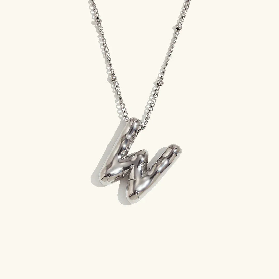 {
  "VA": "VA ヴァンドーム青山 ゴールドイニシャルネックレス"
}