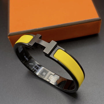 [VA]CLIC HM ARMBAND SCHWARZ GELB