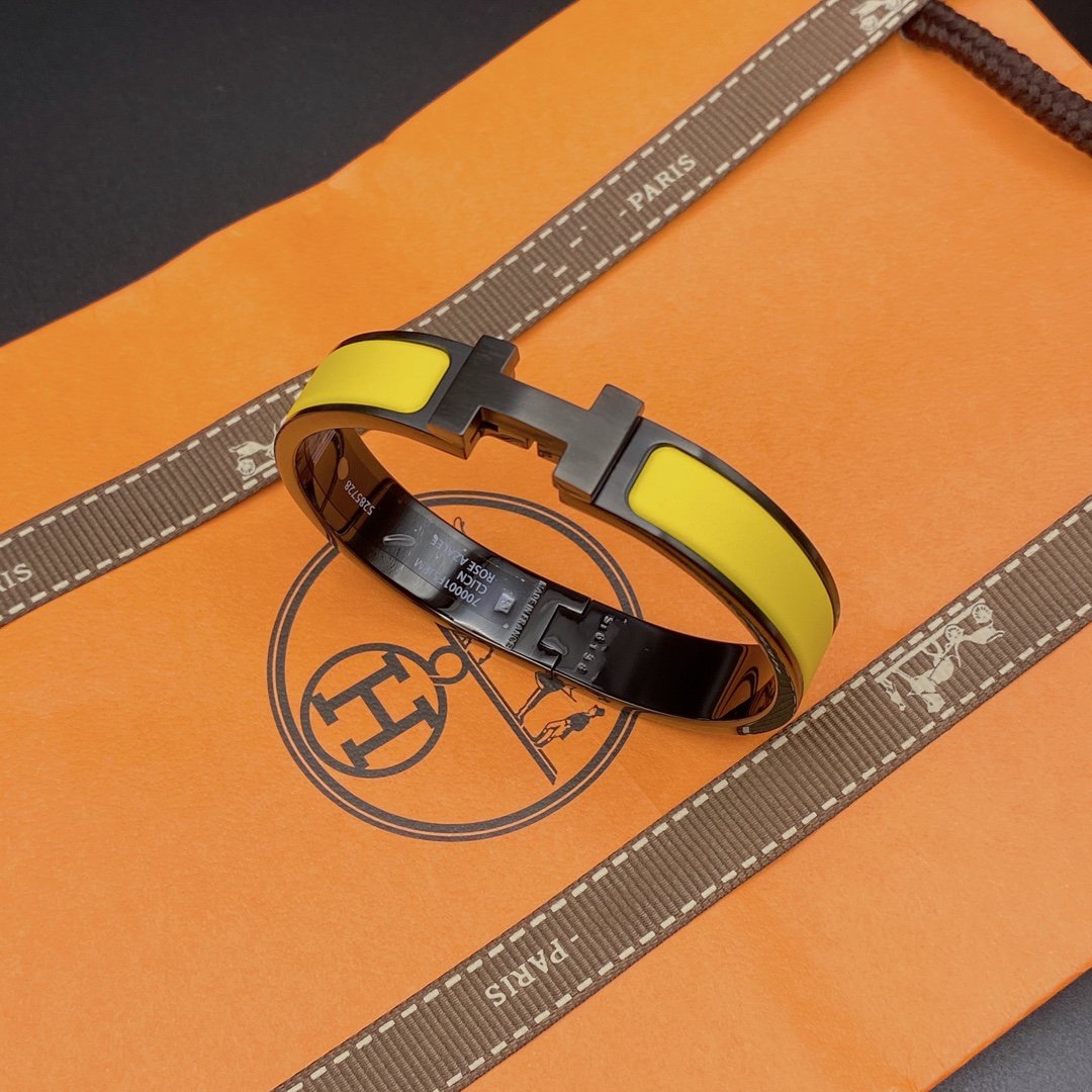 [VA]CLIC HM ARMBAND SCHWARZ GELB