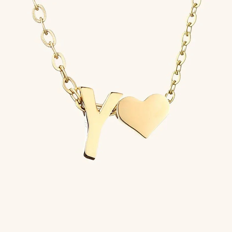{
  "[VA]Ria Initial Letter Gold Necklace": "[VA]Ria イニシャル ゴールドネックレス"
}