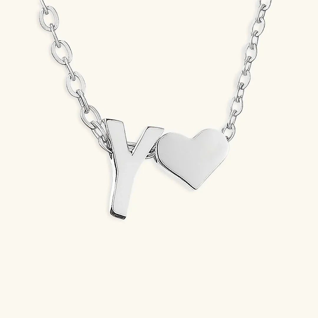 {
  "[VA]Ria Initial Letter Gold Necklace": "[VA]Ria イニシャル ゴールドネックレス"
}