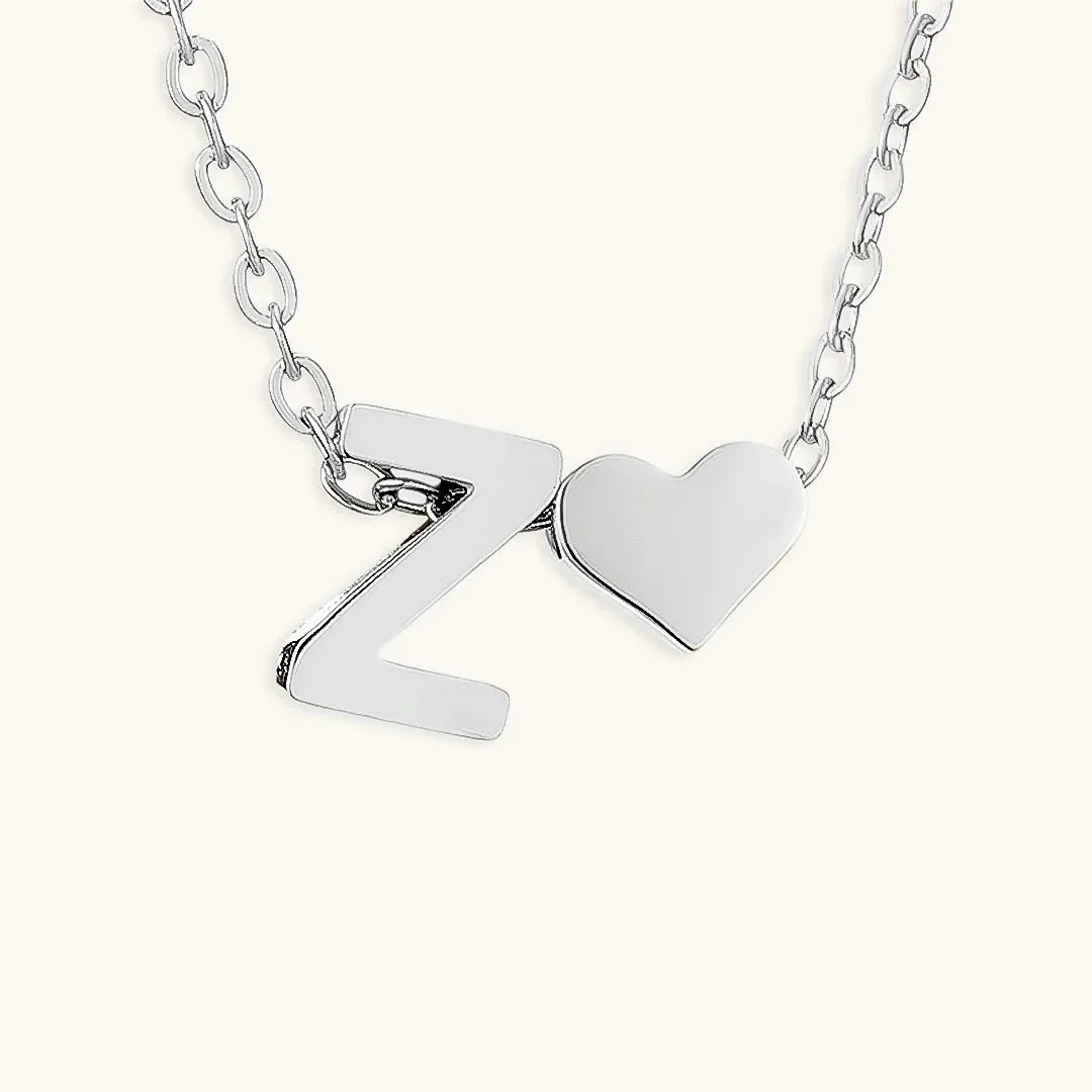 {
  "[VA]Ria Initial Letter Gold Necklace": "[VA]Ria イニシャル ゴールドネックレス"
}