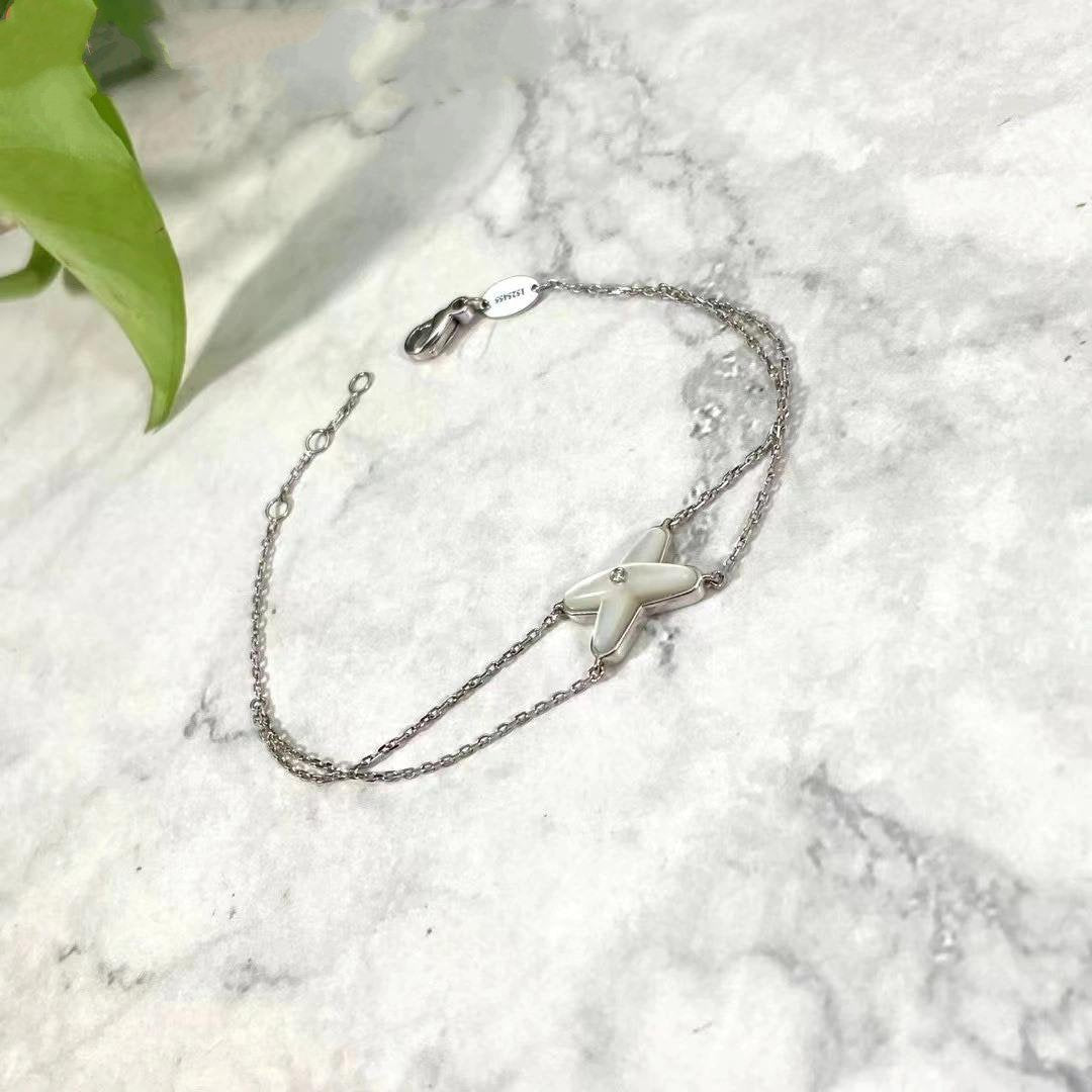 [VA]ARMBAND JEUX WEISSES PERLMUTT SILBER 1 DIAMANT