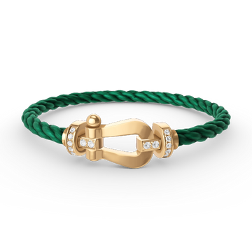{
  "VA": "FORCE LARGE HORSESHOE HALF DIAMOND BRACELET GOLD"
}